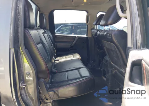 2012 Nissan Titan Pro-4X z USA, uszkodzony, nr VIN 1N6BA0EC7CN304116